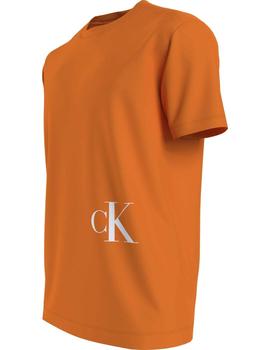 Camiseta naranja con monograma de Calvin Klein abajo